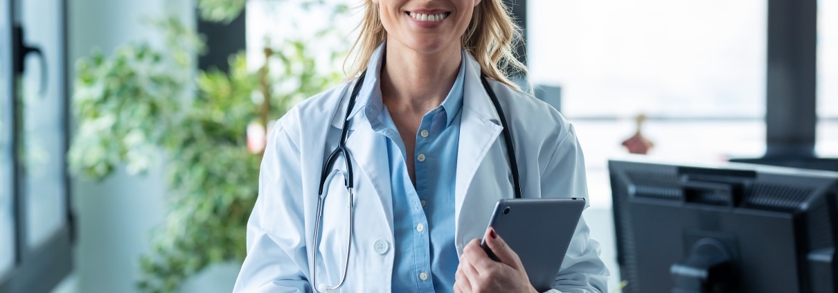 Attractive medical professional with clipboard
